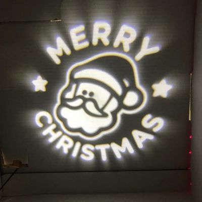 Proiettore faccia babbo natale con scritta